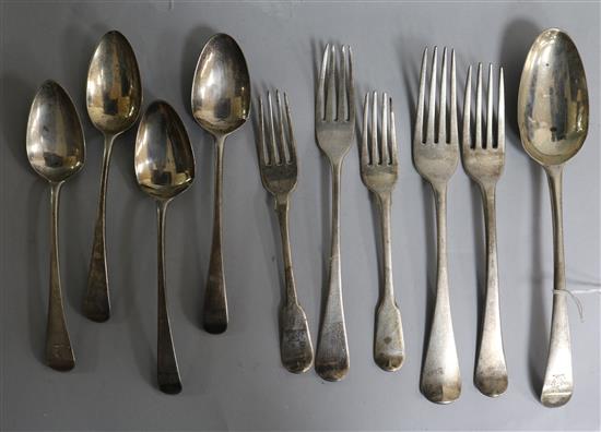 A George III silver Old English pattern tablespoon by Hester Bateman, London, 1784 and nine later assorted silver spoons and forks,